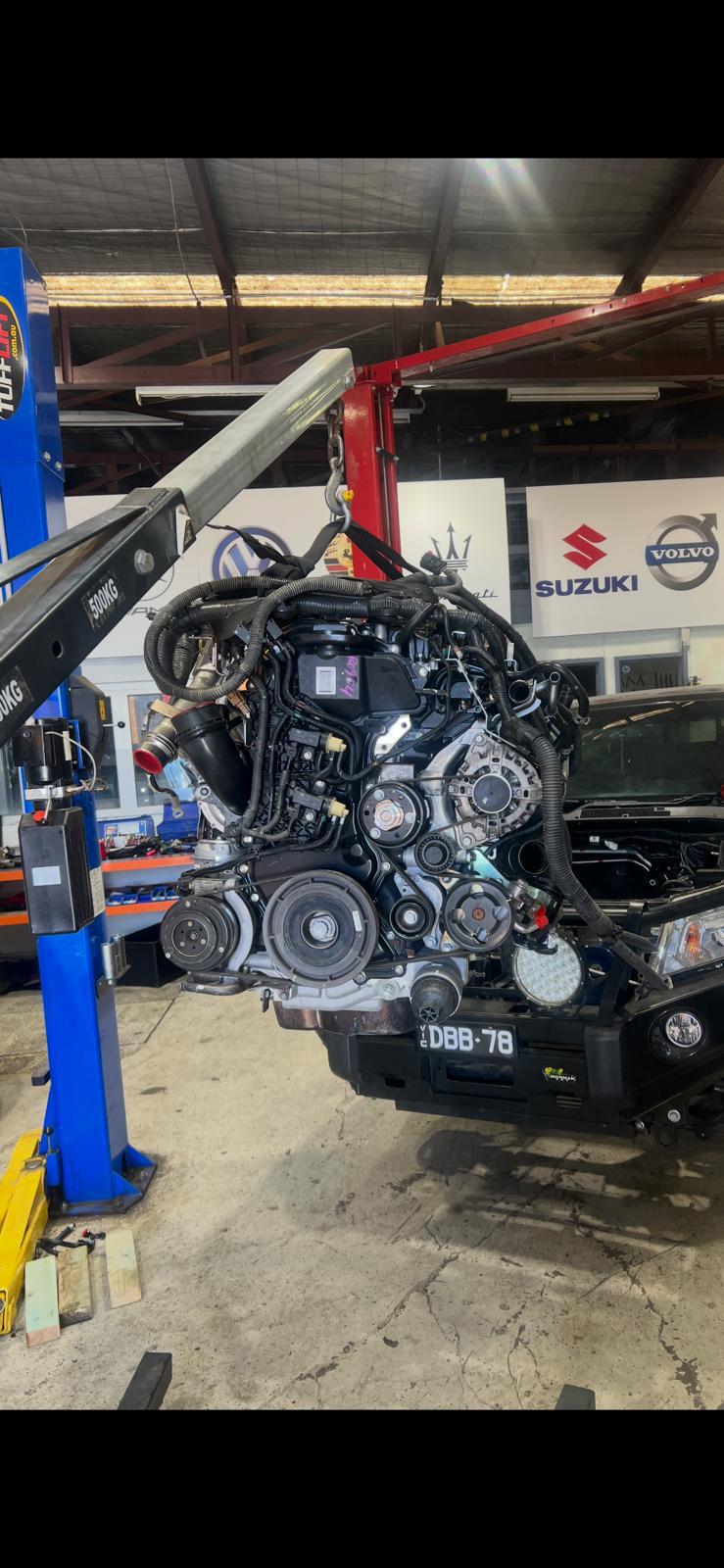 Engine lifted out of a 4WD on the engine crane